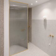 Kuldse profiiliga musterklaas dušiklaasina